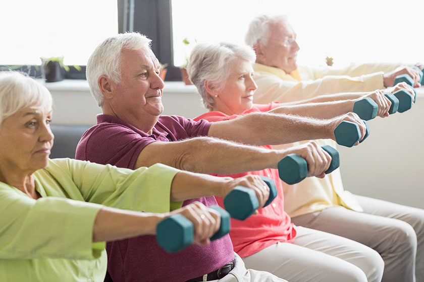 Seniors using weights